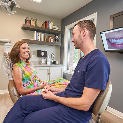 Dr. Hays in a smile consultation with a patient